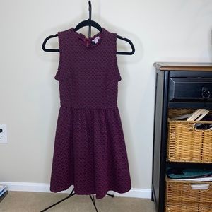 Purple and black mock neck dress.